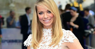 Atomic Kitten's Liz McClarnon is engaged to a mystery man as she flashes huge ring