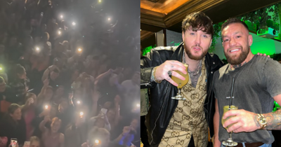 Conor McGregor sends crowd into frenzy at Dublin's Olympia theatre when attending James Arthur gig