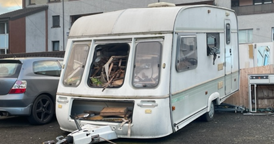 'Eyesore caravan' filled with wood in car park sparks fury from Grangemouth residents