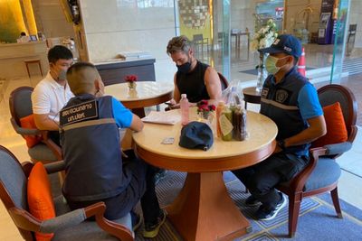 American arrested over soured investments