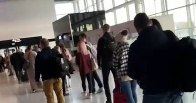 Mum forced to tackle Manchester Airport queues TWICE in another day of chaos