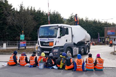 Dozens of climate change protesters arrested after 10 oil terminals blocked