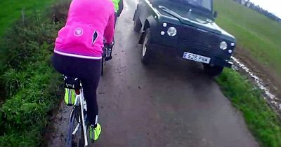 Viewers divided over footage showing cyclist falling into a ditch after a Land Rover drives by