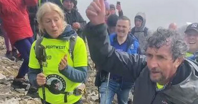 Emotional scenes as Charlie Bird reaches top of Croagh Patrick and completes Climb with Charlie