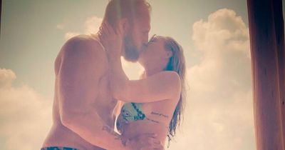 Pregnant Chloe Madeley kisses husband James as she brushes off his 'sea cow' joke