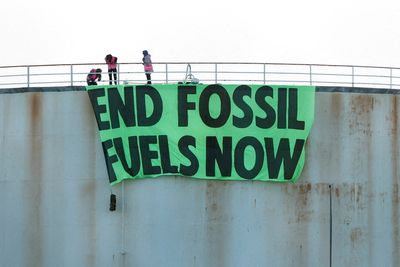 UK police arrest 83 as climate activists blockade oil terminals