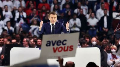 Macron warns of dangers of extremism at election rally as French polls tighten