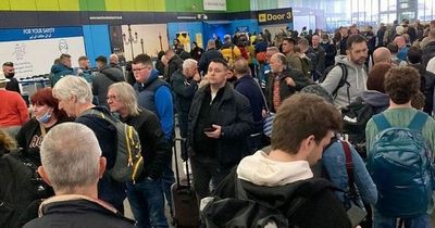 Chaotic scenes at Manchester Airport as passengers 'jump over barriers' and people fear 'someone will get hurt'