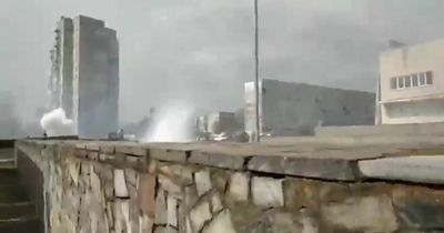 Russian soldiers hurl stun grenades and gunfire heard as they disrupt peaceful Ukrainian protests