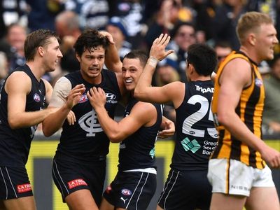 Blues hold on against Hawks in AFL classic