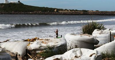 Giant swells smash Stockton and wreak widespread havoc at Hunter beaches