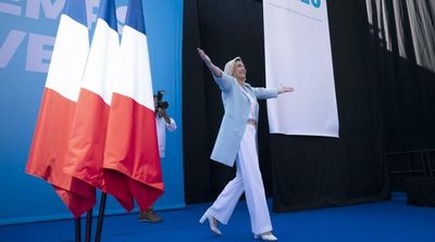 French Far-Right Leader Le Pen Softens Image for Election