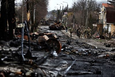 ‘Pure brutality’: Ukraine finds half-burned civilians in mass graves shot in ‘back of their heads’