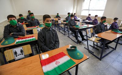 Iran fully reopens schools a day after two years of COVID closure