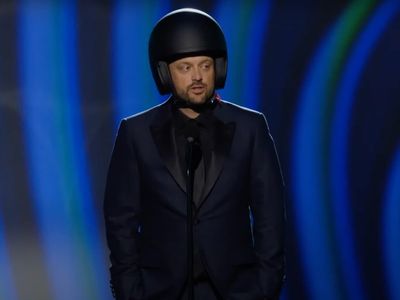 Nate Bargatze presents Grammy wearing helmet: ‘Comedians have to wear these now at awards shows’