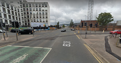 Man remains in hospital after West Belfast crash