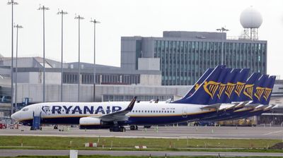 Ryanair to post at least £294m loss as passenger numbers recover