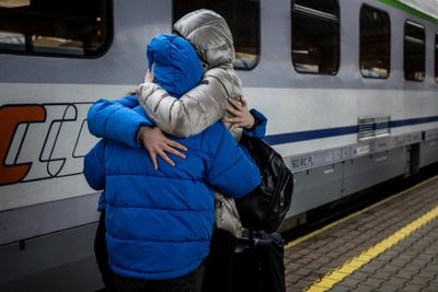 War or no war, Ukrainian families board train home