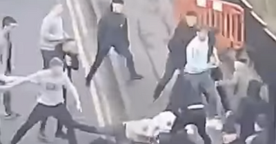 Sickening footage shows football fans brawl in violent Dundee street fight as men left injured