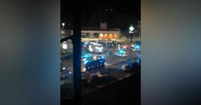 Man rushed to hospital as police close road after serious crash outside supermarket