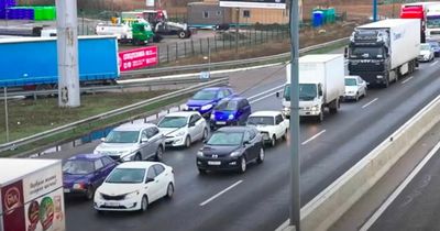 Traffic jams in Ukraine for people heading BACK to Kyiv after Russian withdrawal
