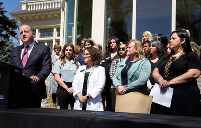 Colorado governor signs law to protect abortion rights