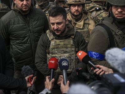 Ukraine news – live: Zelensky says Russia hiding war crimes, as Macron accused of ‘negotiating with Hitler’