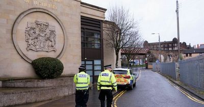 Man stabbed five times in front of horrified neighbours in street attack