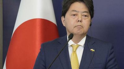 Japan Minister Brings Ukrainians from Poland on Government Plane