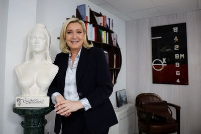 France's Le Pen strives to build on ratings boost to further detoxify her image