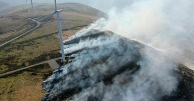 Dramatic aerial photos show scale of grass fire devastation on Welsh mountainside