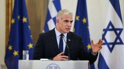 Israeli FM Condemns 'War Crimes' in Ukraine