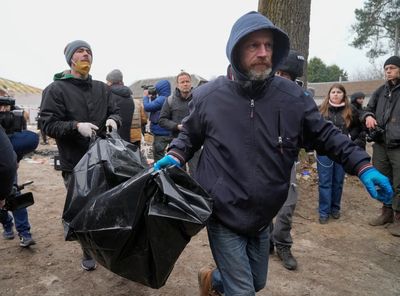 In Bucha, Ukraine, burned, piled bodies among latest horrors