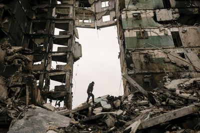 AP PHOTOS on Day 41: Buildings in ruin, bodies found