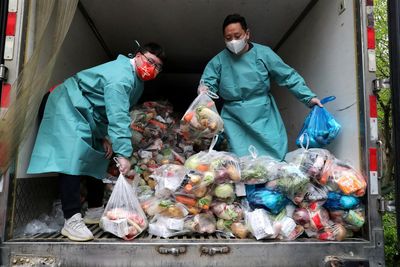 Shanghai scrambles to secure food supplies as COVID lockdown hits