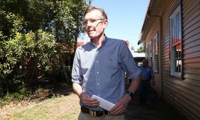 NSW flood victims missing out on federal relief because of where they live, premier says