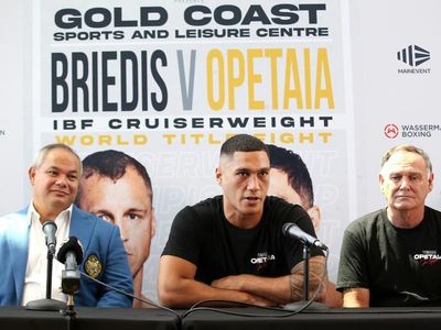 Injured Opetaia delays world title fight