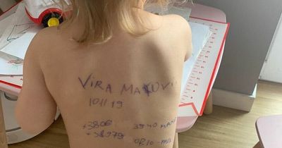 Ukraine mums writing names and contact details on children's bodies so they can be identified if the worst happens