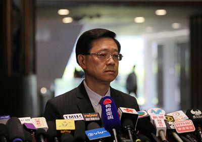 Hong Kong No. 2 official says he plans to run in leadership election