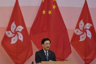 Former Hong Kong security chief declares leadership bid