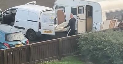 Video captures two men filling 'eyesore' Grangemouth caravan with rubbish