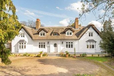 £5.5 million thatched mansion six times the size of a traditional cottage for sale in north London