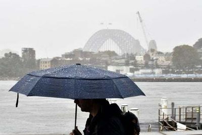 Thousands evacuated as Sydney hit by month’s worth of rain in a night