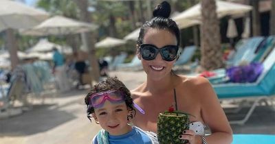 Martine McCutcheon continues to show off weight loss in fitted swimsuit on family getaway