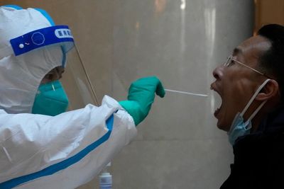 Shanghai wrestles with food shortages under virus shutdown