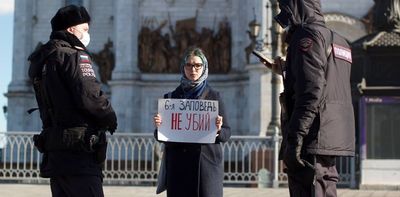 Russia's feminists are protesting the war and its propaganda with stickers, posters, performance and graffiti