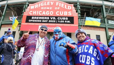 A few degrees above freezing. No matter. Passion burns bright for Cubs fans on Opening Day