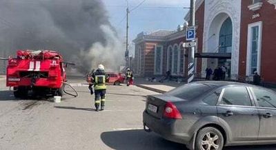 Horror and outrage after massacre of fleeing families in Russian rocket strike on Ukraine railway station
