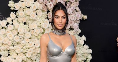 Kim Kardashian stuns in tight silver dress for first red carpet appearance with Pete Davidson