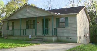 Mystery as body found rolled up in rug inside abandoned home 'for months'